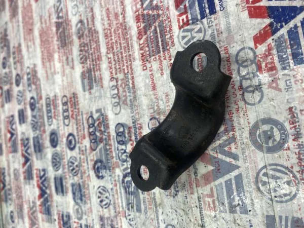 7H0511418 | VW Transporter Viraj Demiri Lastik Kelepçesi VAG